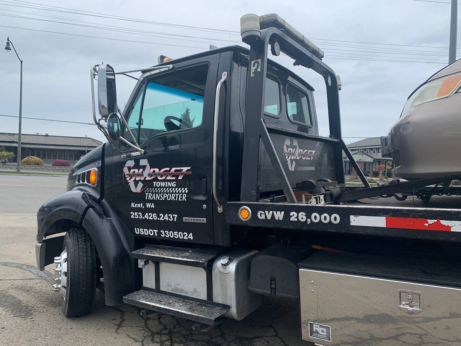 Budget Towing And Transport Black Truck