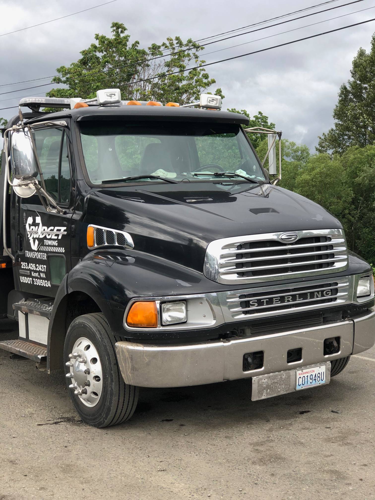 Budget Towing And Transport Truck